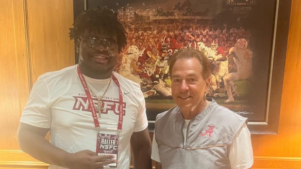 Eddy Pierre-Louis with Nick Saban